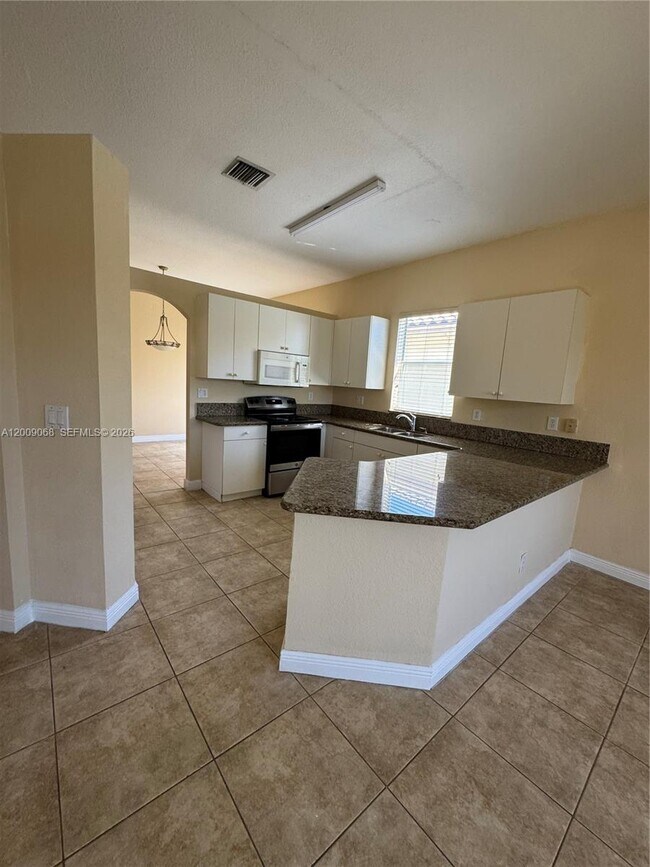 Building Photo - 12860 SW 51st St