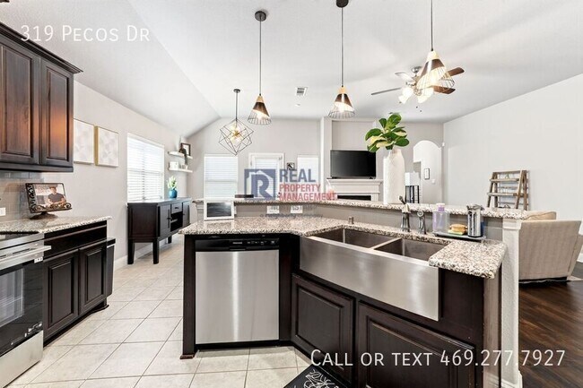 Building Photo - 319 Pecos Dr