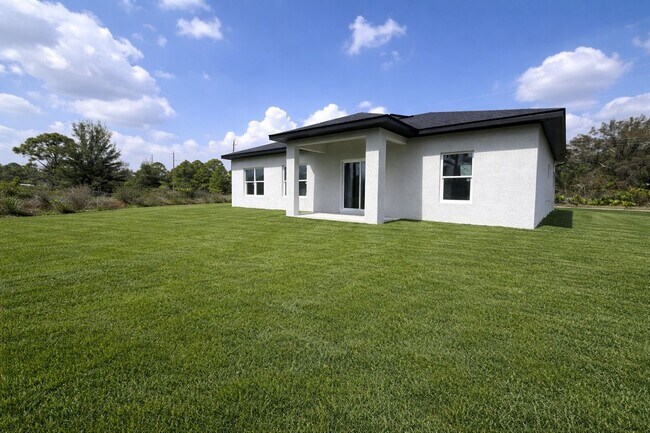 Building Photo - BRAND NEW MODERN SF HOME 3BD+den/2BA with GARAGE IN LEHIGH ACRES!