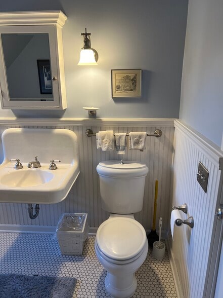 East Bathroom sink and toilet area - 1228 Forest Ave