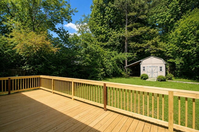 Building Photo - Updated Multi-Bedroom Home | Brand-New Deck | Circular Drive | Triad Premier Realty