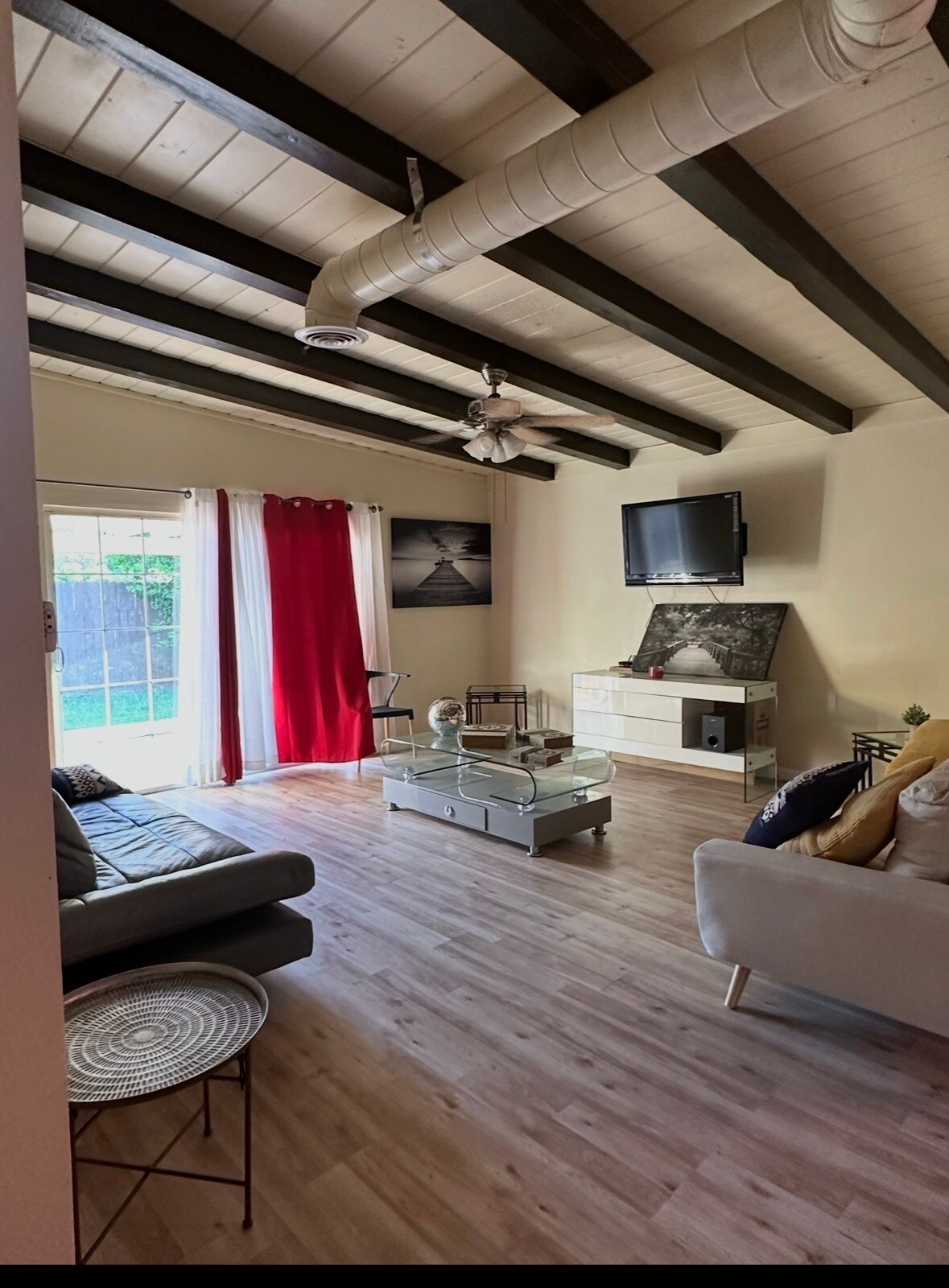 Living room with view to access to the back yard - 16964 Millstone Dr