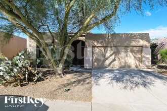 Building Photo - 8551 N Rolling River Dr