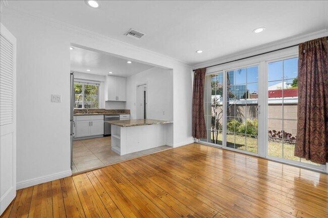 Building Photo - Corner lot home on a classic tree lined Beverly Hills street