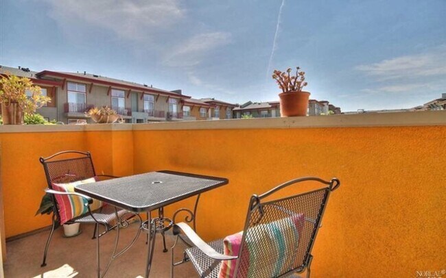 Building Photo - Modern 2BR/2.5BA Condo with Ensuite Bathro...