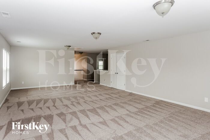 Building Photo - 6906 Barefoot Forest Dr
