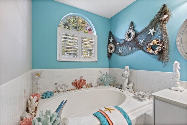 Building Photo - Two Bedroom/Two and a half bath gated townhome.