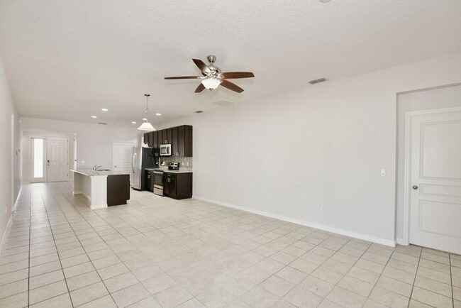 Building Photo - Stylish 4/3 Home with Covered Patio & Gara...