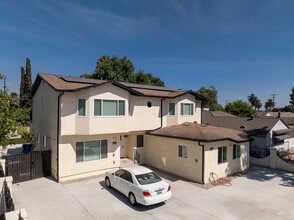 Building Photo - 10342 Dempsey Ave