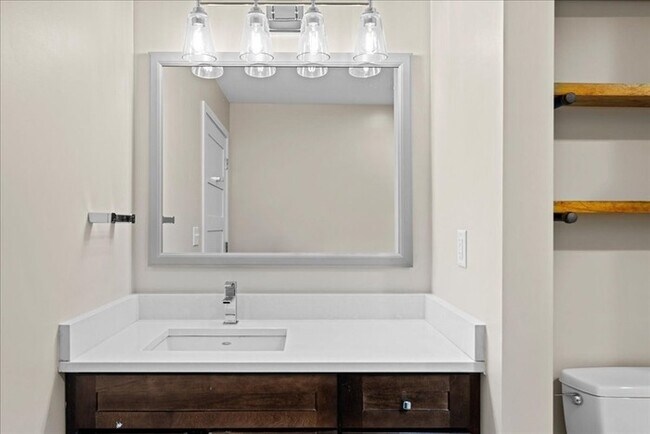 Building Photo - Stylish Industrial Loft with Exposed Brick, High Ceilings & Modern Kitchen