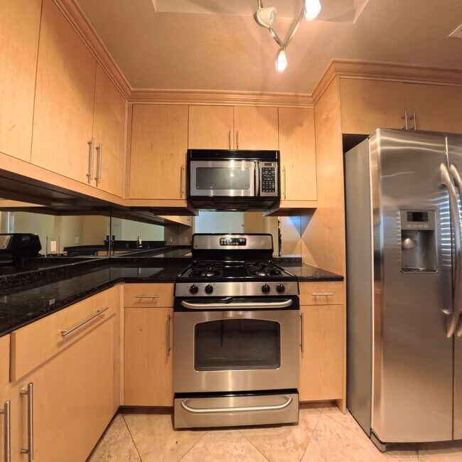 Building Photo - Luxury Mid-Rise | Guard Gated | Underground Garage Area | Resort Style Amenities