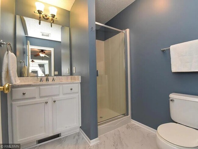 Building Photo - 3 Bedrooms | Loft | Upper-Level Laundry | 3-Sided Fireplace | Woodbury