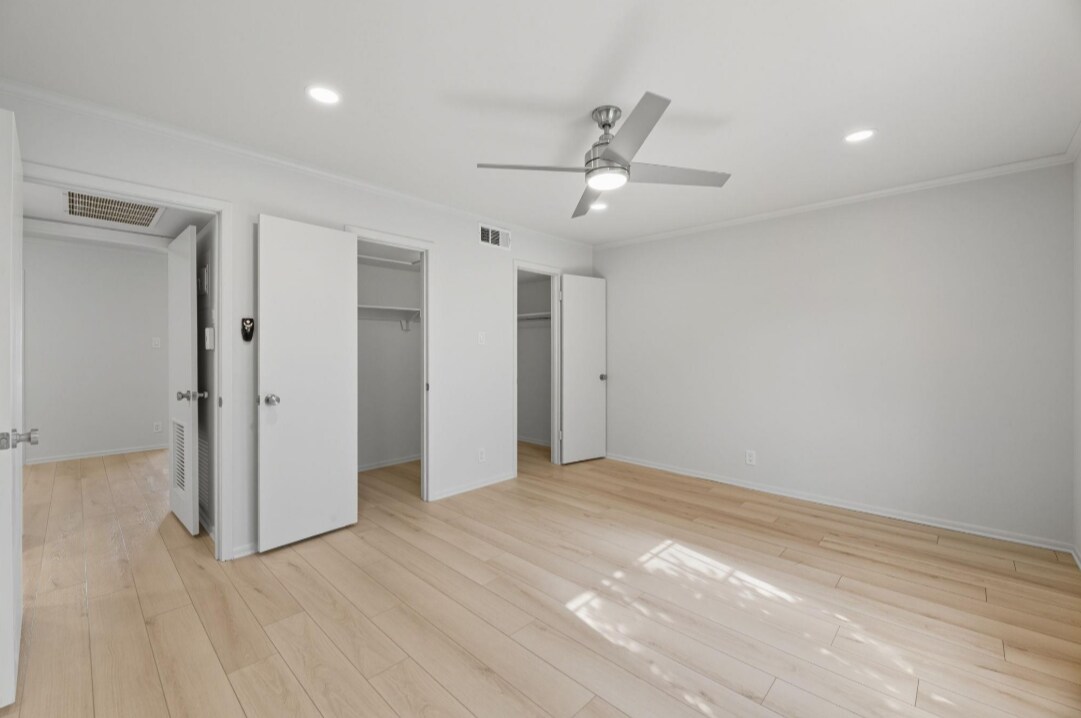 Master bedroom with large walk-in closet. - 7920 Rockwood Ln