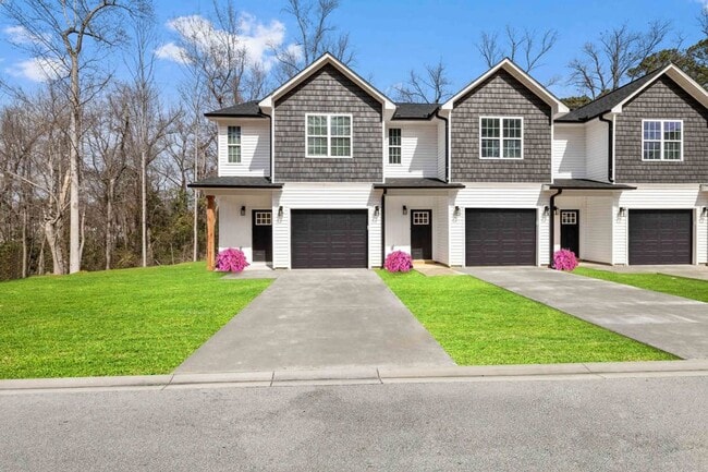 Building Photo - Luxury New 3BR Townhomes | Garage + Pool |...
