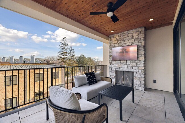 Gas fireplace and cedar ceiling are features of the covered balcony space - 511 2nd St