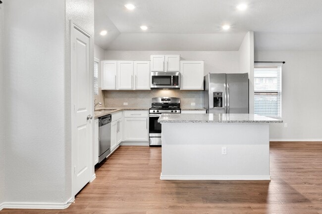 Building Photo - $300 off One Month's Rent! Charming Home with Elegant Granite Countertops and Cabinets