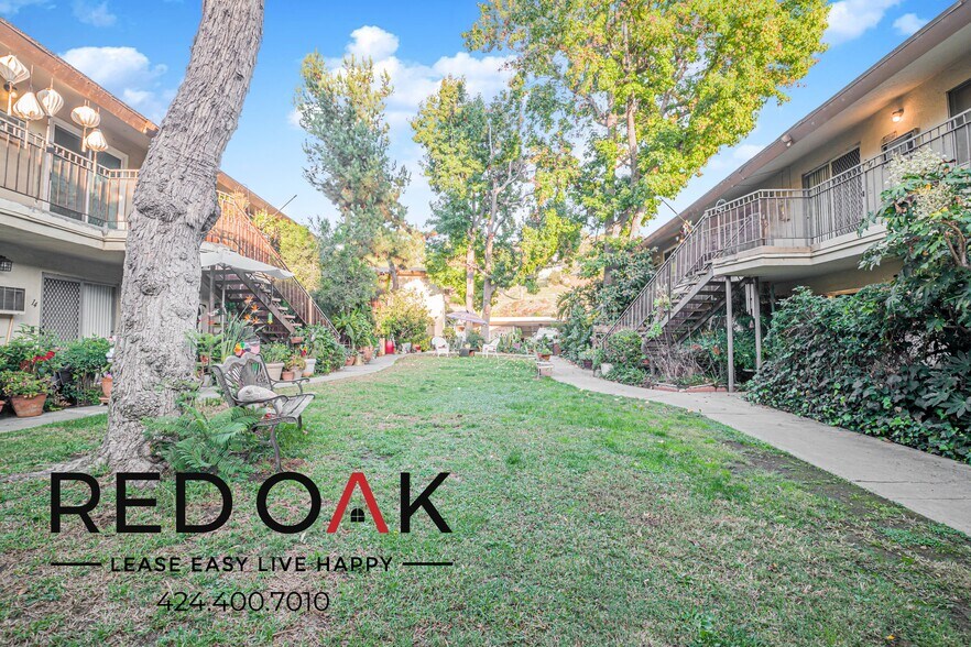 Building Photo - 211 S Ave 57