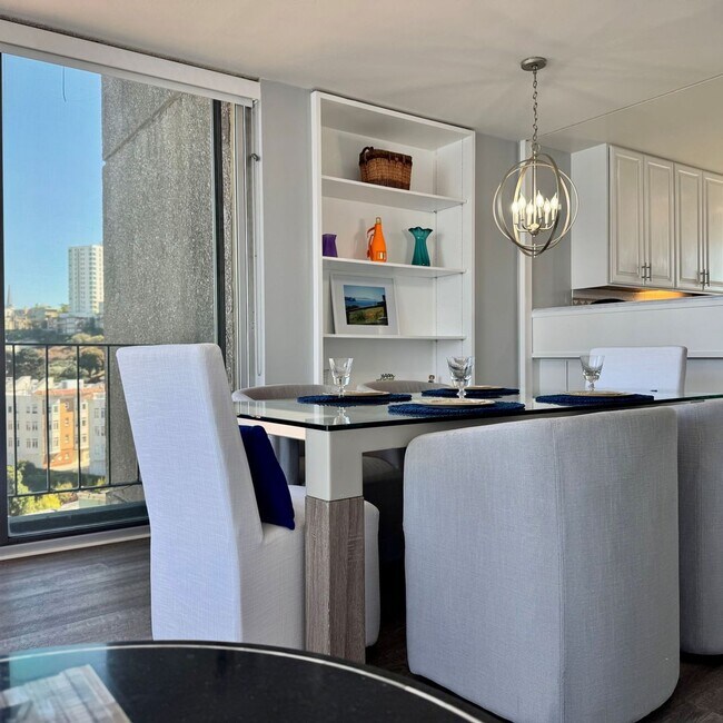 Building Photo - Just Unpack, Pour a Beverage, & Cue the Su...