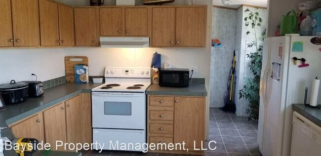 Building Photo - Manufactured home offers privacy and comfort sitting on a 1 acre property with mountain views in ...