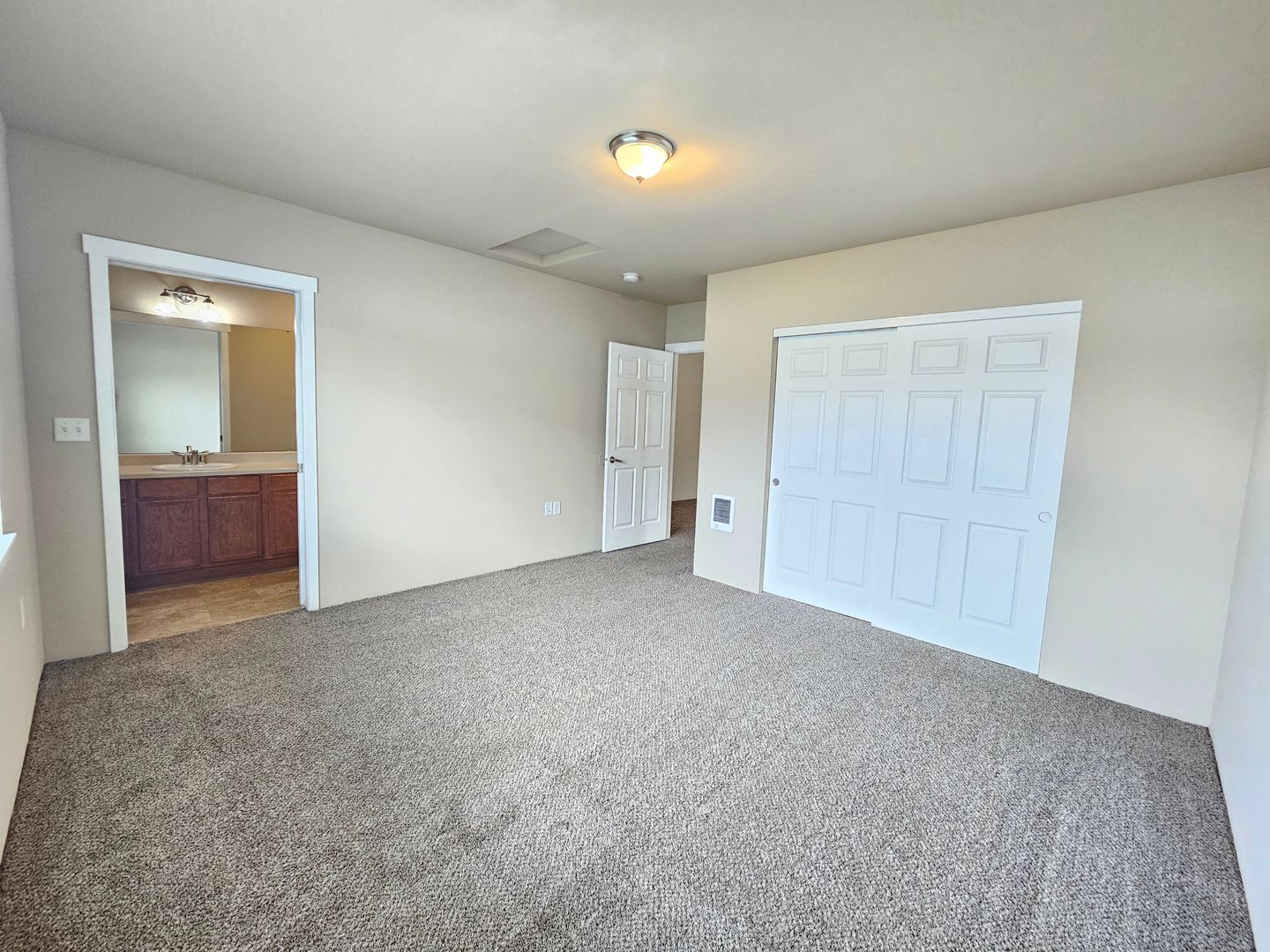 Building Photo - 5205 -5207  E. Upriver Dr.