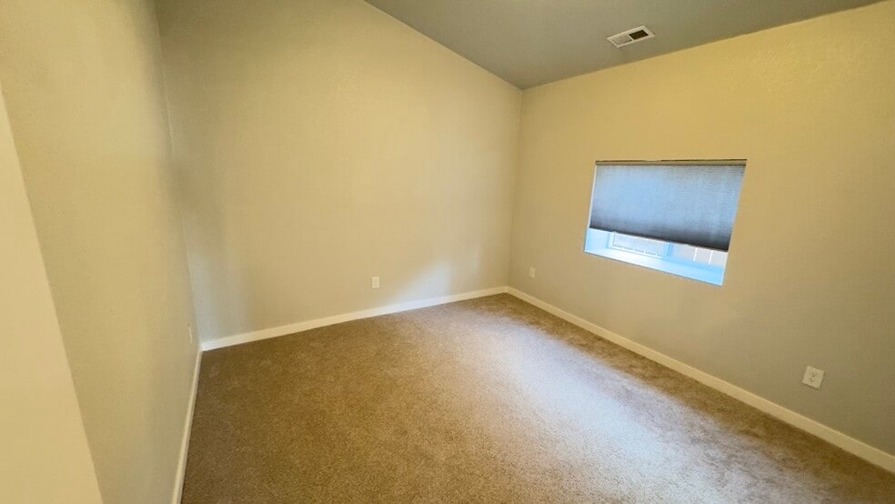 The spare medroom offers a single closet and great built in counterspace by the window - 521 Perry St