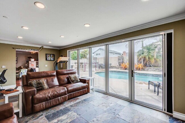 Building Photo - Entertain. Relax. Repeat.