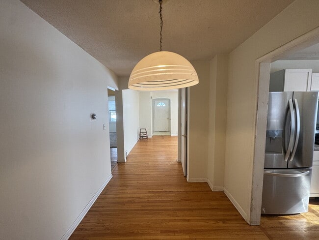 Building Photo - "Charming 3-Bed Haven with Hardwood Floors & Cozy Fireplace in St. Louis Park!"