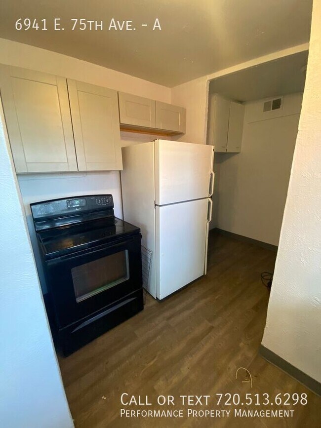 Building Photo - 6941 E 75th Ave