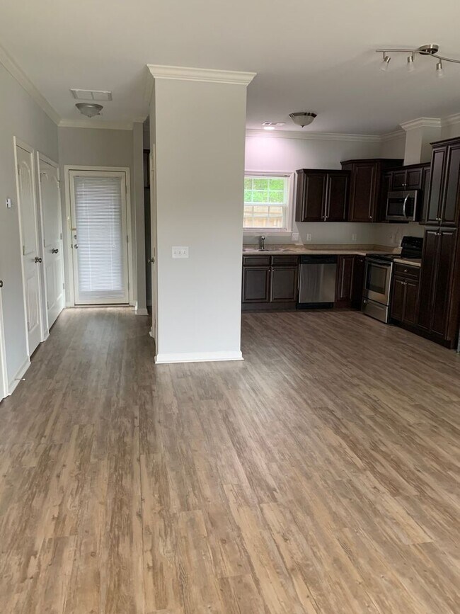 Building Photo - Yorktown Place-Gated Townhome Community-Tibet Ave.