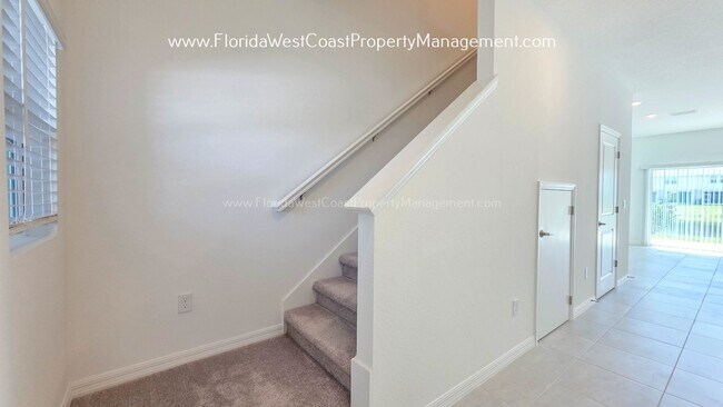 Building Photo - OUTSTANDING BRAND NEW TOWNHOME MOVE IN READY! AZARIO TOWNHOMES LWR !