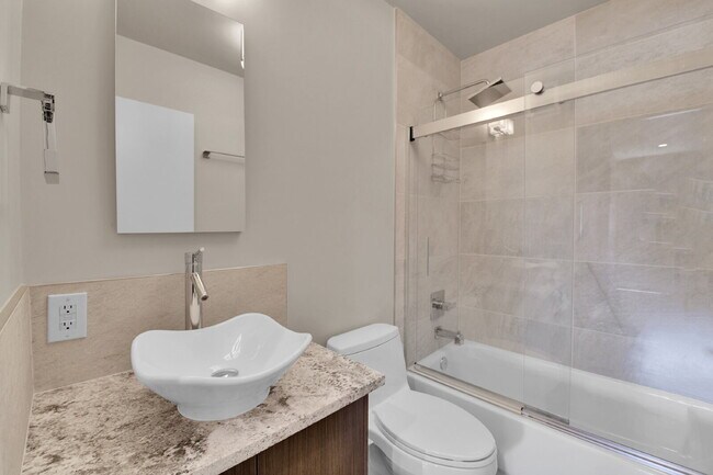 Building Photo - $3,100 - 2 Bed, 2 Bath Lofted Condo in Den...