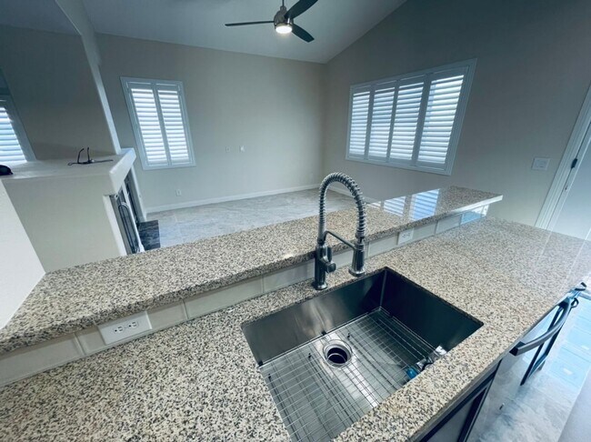 Building Photo - Single-story 4 Bed nestled in the desirable Green Valley Ranch!  3 Car Garage!