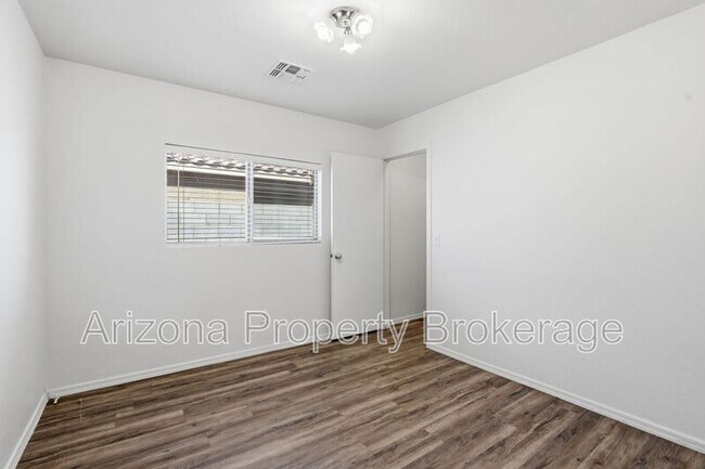 Building Photo - 15535 W Port Au Prince Ln