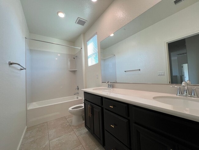 Building Photo - Beautiful 4 Bedroom Home With Low Maintenance Landscaping And Updated Interior