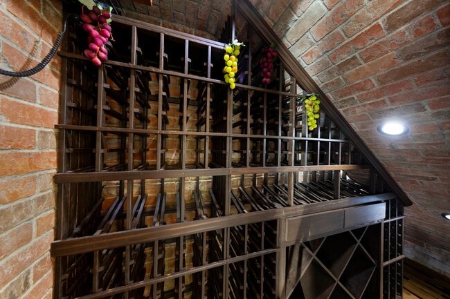 Building Photo - Beautifully maintained Tuscan-style custom home