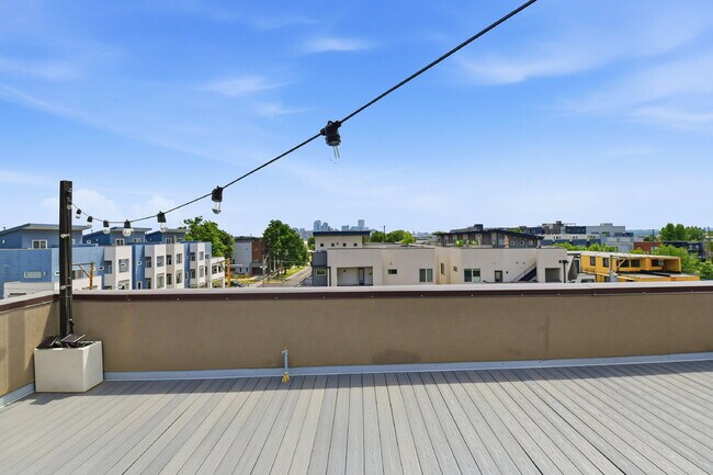 Building Photo - $2,890.95, 2-bed, 2.5-bath, located in Denver with a rooftop terrace.