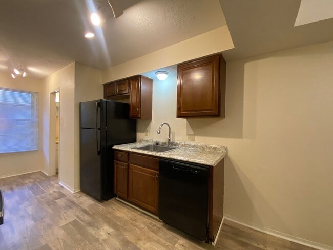 Building Photo - Charming 2 Bedroom, 2.5 Bath Condo, Move-In Ready! Step into this beautifully maintained condo fe...