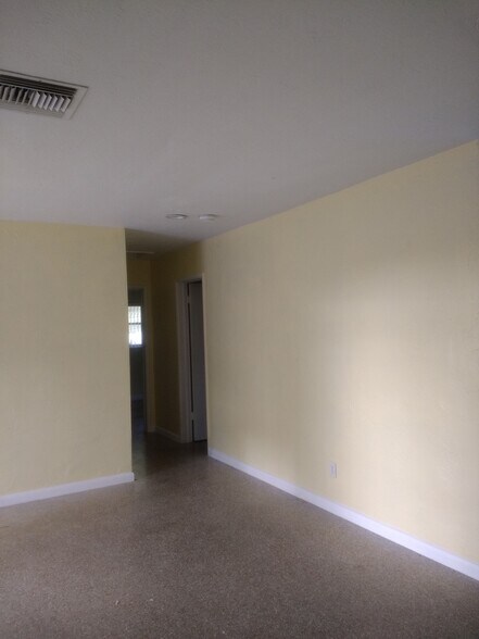 Hallway View of Room at the end and Bathroom (Across room not seen in pic) - 4850 Southwest 41st Avenue