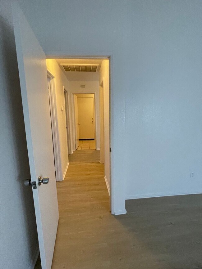 Building Photo - Adelanto Home-3 Bedrooms,2 Bathrooms, Laminate Floors, Indoor Laundry Room, Large Back Yard