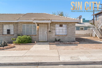 Building Photo - "Charming 1-Bed Duplex with Hardwood Elegance in Downtown Las Vegas!"