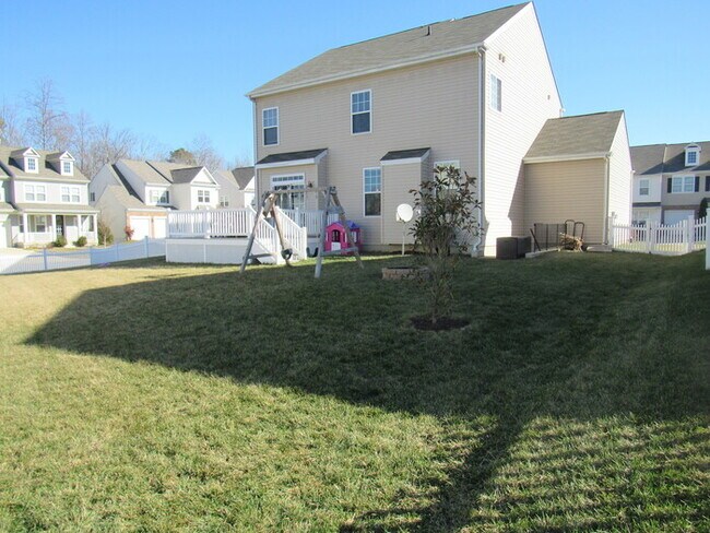 Building Photo - Pet Friendly 2 Story with Basement and 2 C...