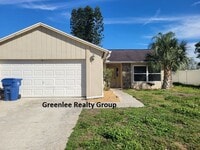 Building Photo - Relax by the water in this spacious 2-bedroom home with a 2-car garage, nestled in the highly des...