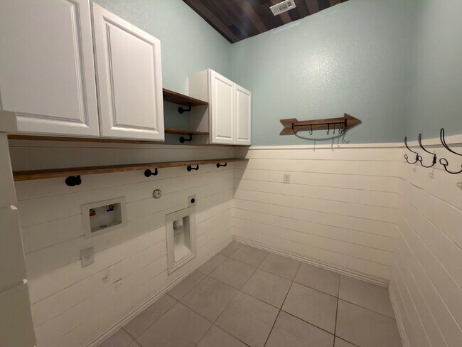 Building Photo - Four bed two bath on a corner lot with a pool in Sunfield. Gas cook top, double ovens. Open kitch...