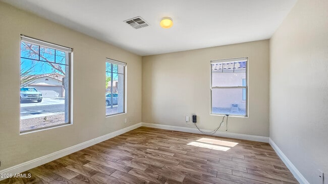 Building Photo - 25673 W Northern Lights Way