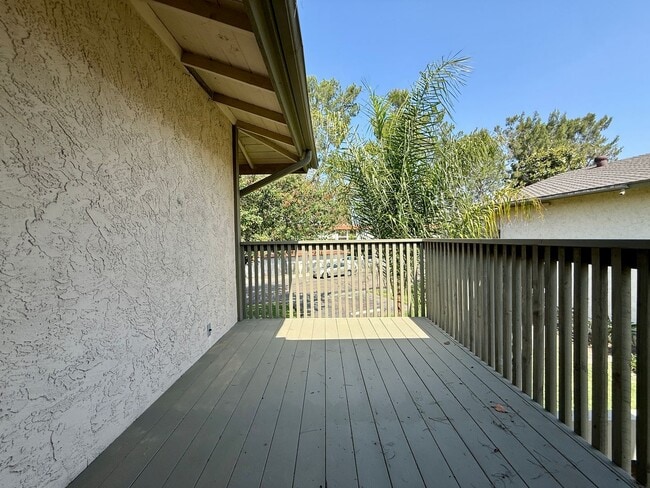 Building Photo - Spacious & Stylish Mission Plymor Townhome! 2 Assigned Parking! AC!
