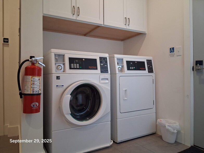 1st floor laundry center with coin-operated Speed Queen washer + dryer - 517 18th St
