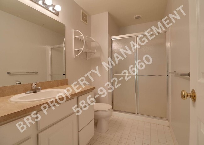 Building Photo - Move-In Ready 2BR Condo with Covered Garage in Harrison Township