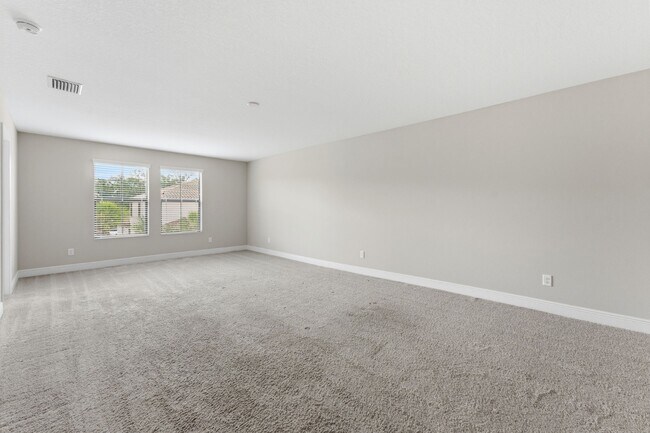 Building Photo - Absolutely Stunning 4 BR + LOFT + OFFICE/2.5 Bath/2 Car Garage home in Starkey Ranch!