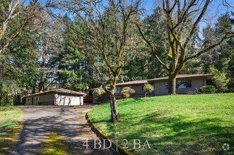 Building Photo - 4BD|2BA - Enjoy Rare 2 Acre Property In Ha...