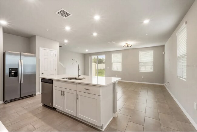 Building Photo - Charming 3-Bed Oasis in Ocoee: Spacious 1574 sq. ft. Townhouse with 2.5 Baths!